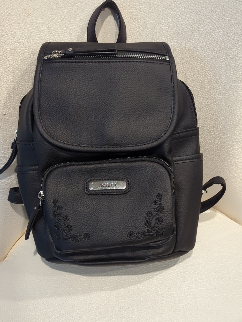 Rosetti Black Pebbled Mini Backpack with Subtle Floral Detail